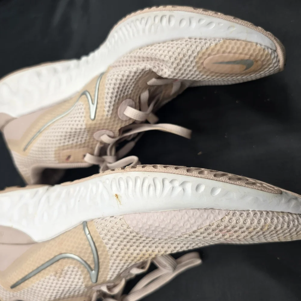 Nike Cream and White Athletic Shoes with Streamlined Design‎